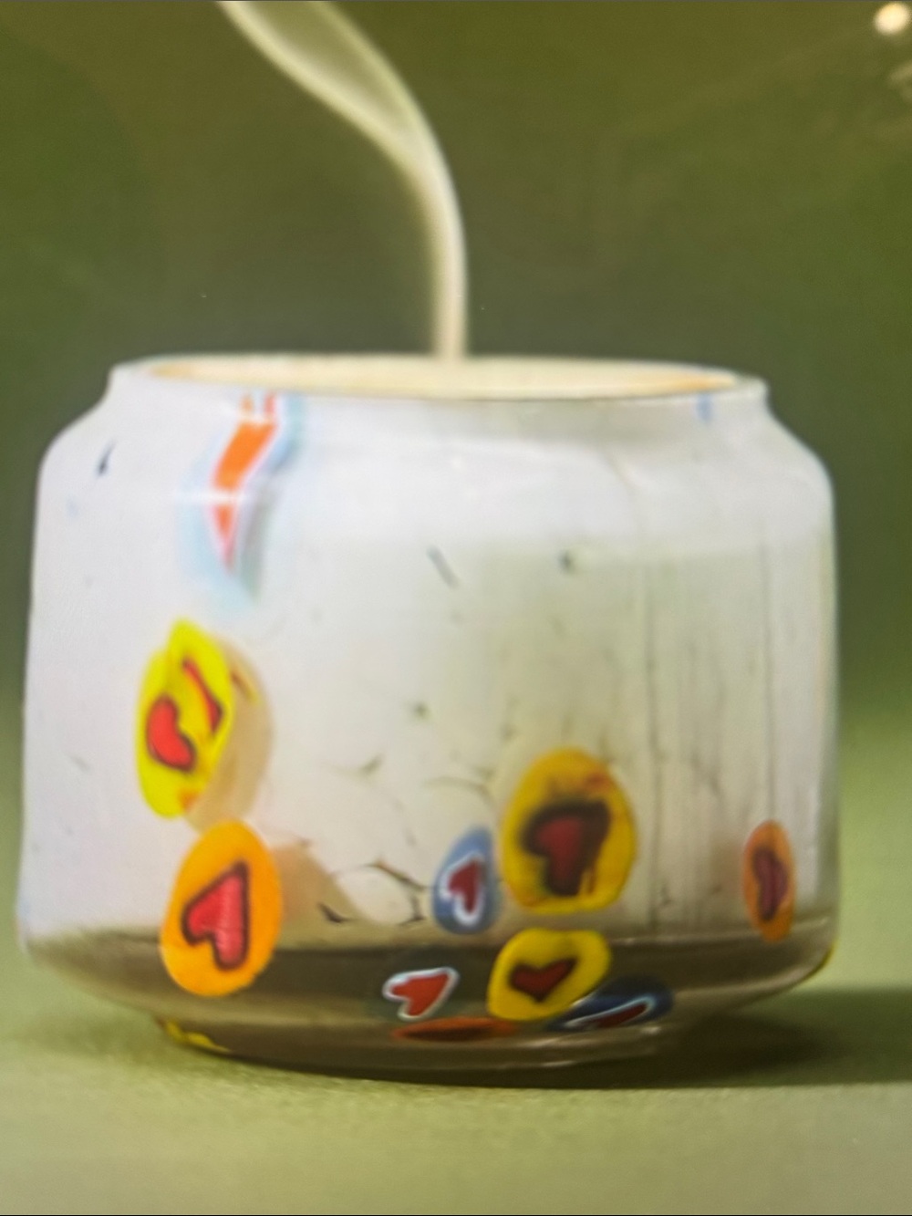 Anthropologie White Glass Candle Holder with Multicolor Heart Medallions